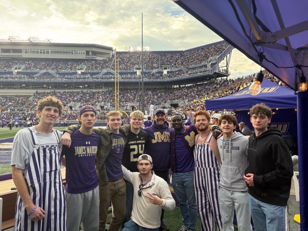 Brothers on the sideline at a JMU football game